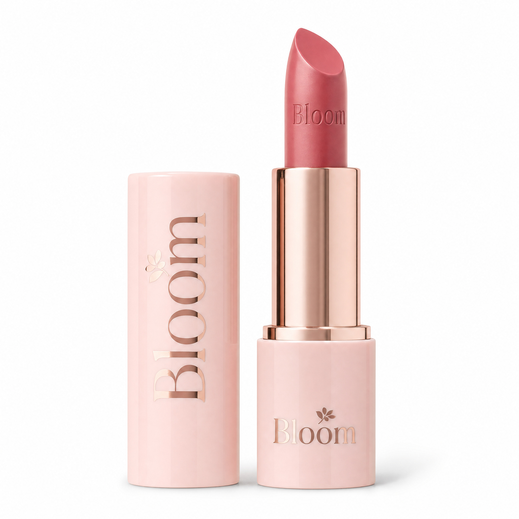 Product packshot: an open rose-gold lipstick beside its closed pink case on a white background