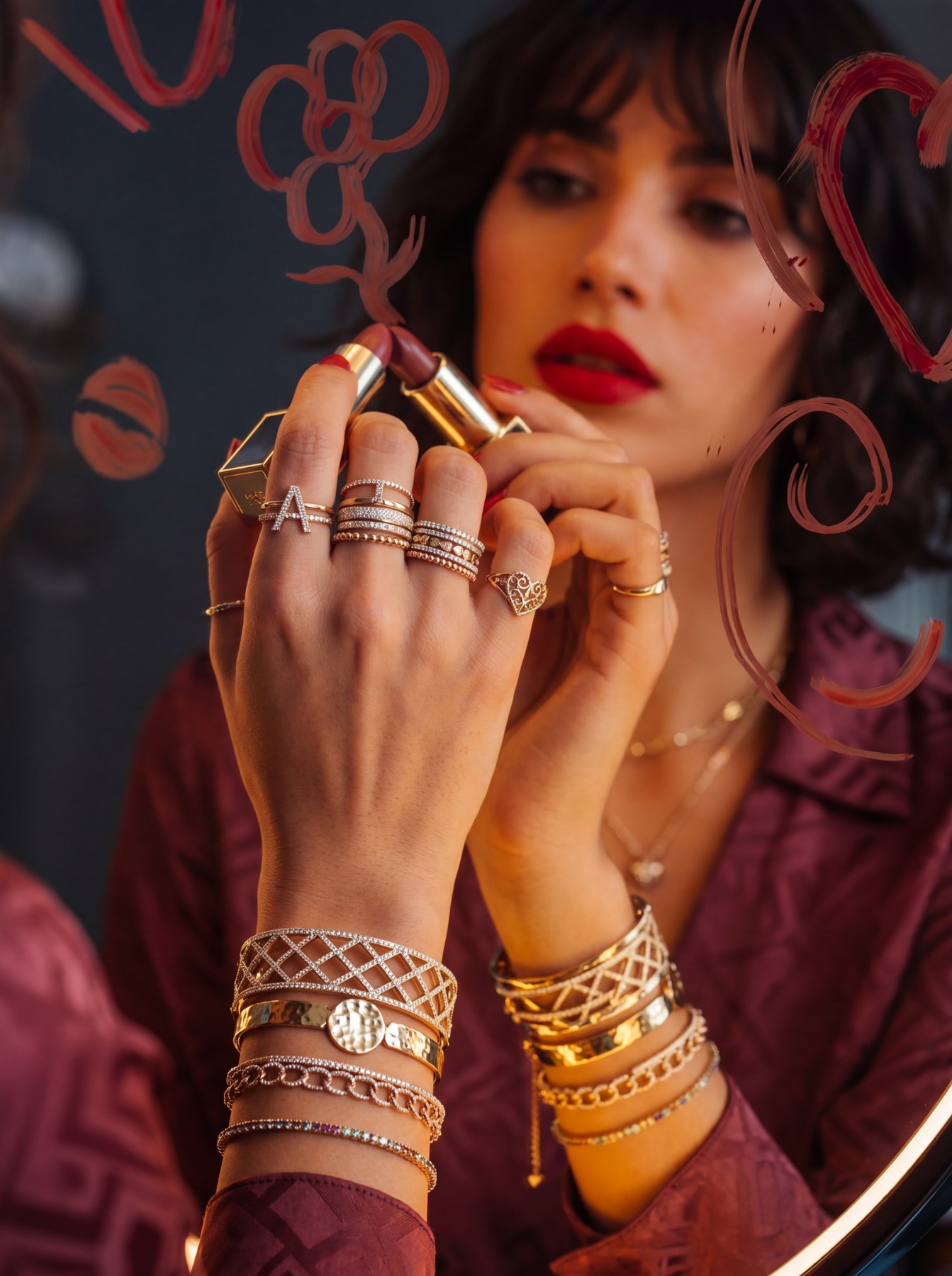Mirror lipstick editorial with jewelry styling, intimacy, and a premium beauty mood.